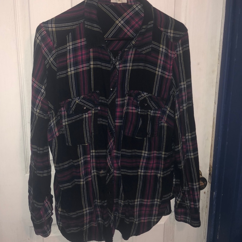 Beautiful warm plaid design. Button up top.
